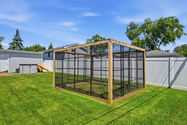 Screened garden enclosure in backyard