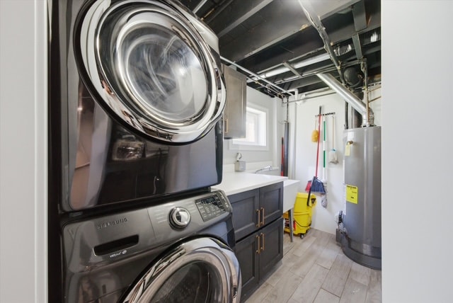 Laundry room with Samsung stacked washer and dryer