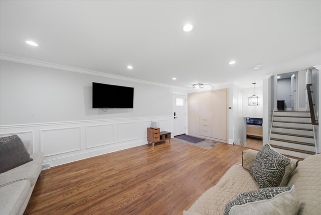 Living room with wainscoting, TV wall and entryway